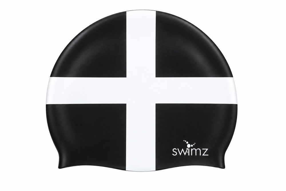 SWIMZ Cornwall flag silicone swim cap in black with a white St Piran’s cross and white SWIMZ logo.